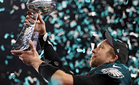 Philadelphia Eagles Captain Nick Foles lift the Super Bowl cup 