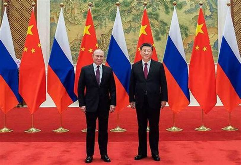 (L) President Vladimir Putin of Russia (R) President Xi Jinping of China